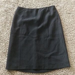 Kuhlman black midi skirt